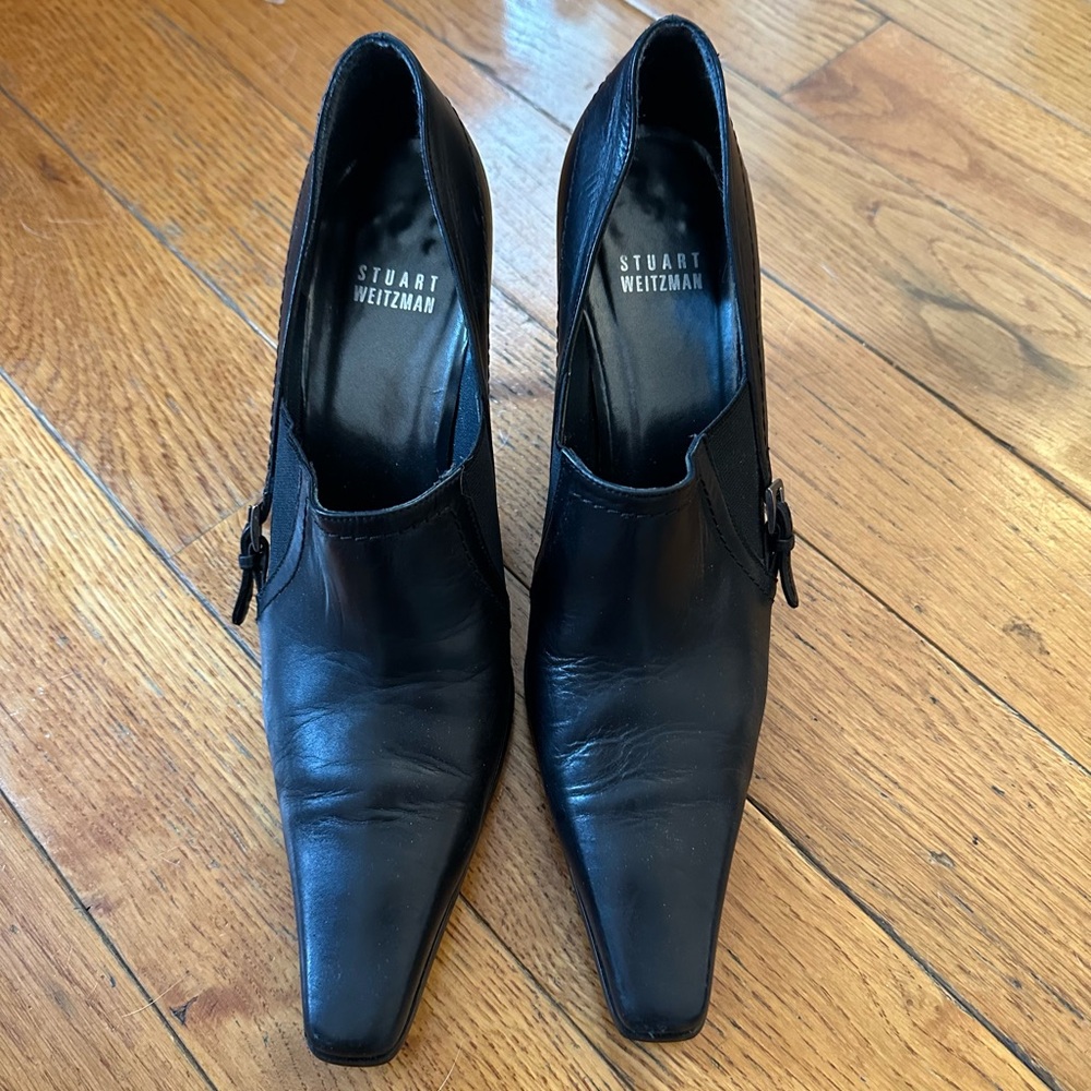 Stuart Weitzman Black Leather Mules with Sleek Design